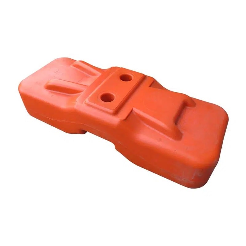 Heavy-duty orange plastic weight block for stability and support in outdoor applications.
