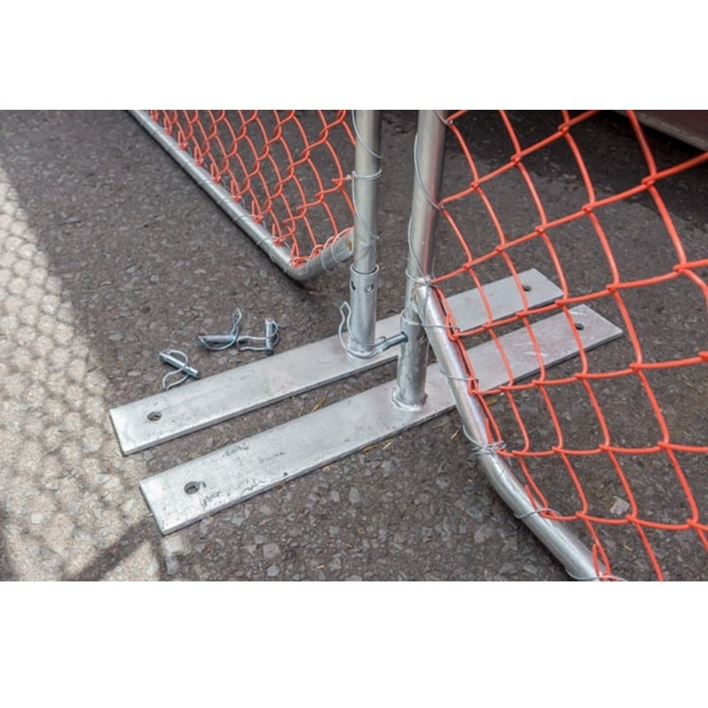Heavy-duty orange safety fence with metal supports, ideal for construction sites or event barriers.