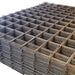 Steel reinforcement mesh panels, lightweight, durable, perfect for construction projects, flat stacked arrangement.