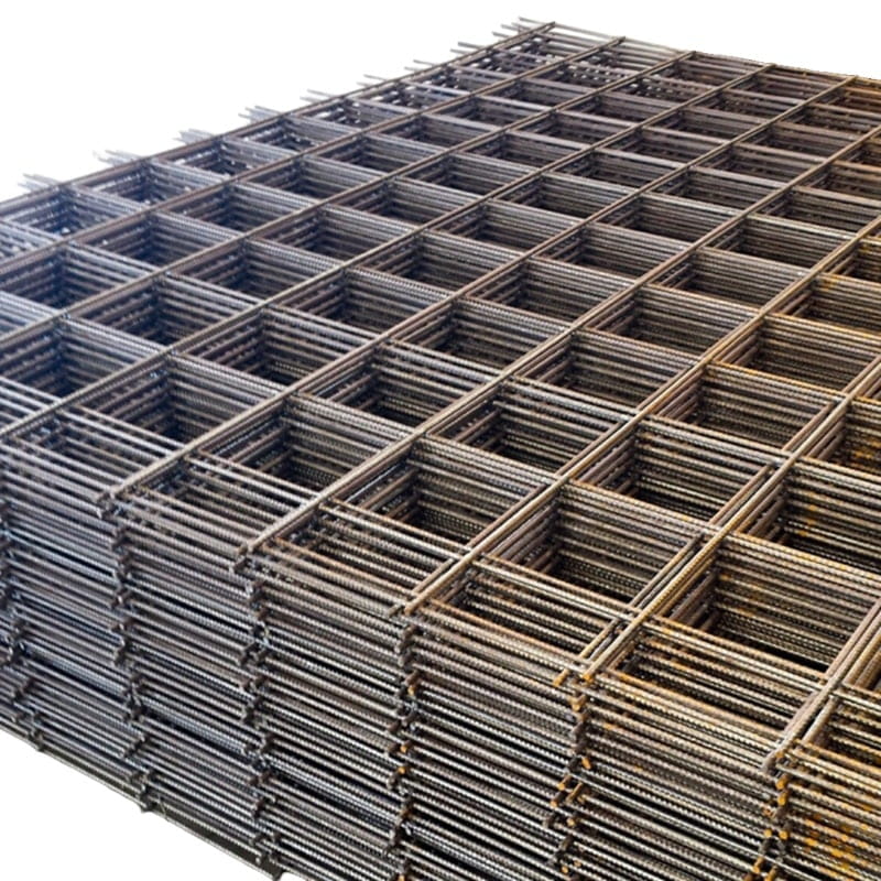 Steel reinforcement mesh panels, lightweight, durable, perfect for construction projects, flat stacked arrangement.