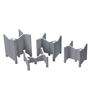 Set of four gray plastic corner brackets for secure shelving and organization.