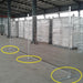 Silver galvanized temporary fence panels for construction sites with sturdy bases.