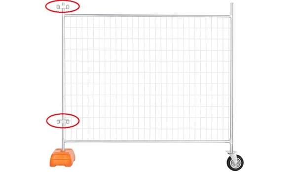Durable metal construction temporary fence with orange base and rolling wheels, ideal for construction sites.
